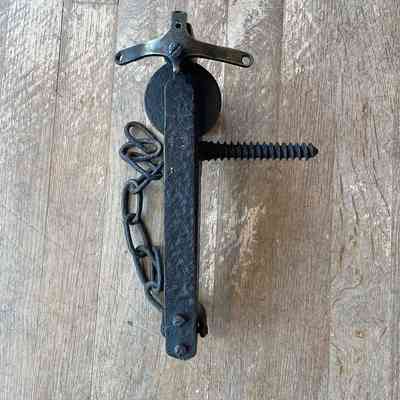 Anti poacher gun showing screwing for fixing and trap elements for wire to be attached