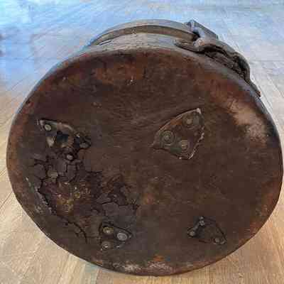 Bottom of leather and canvass bucket, showing strengthened rivets.