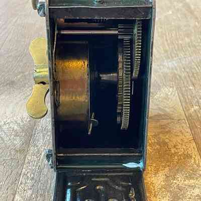 Showing the brass workings inside the metal box