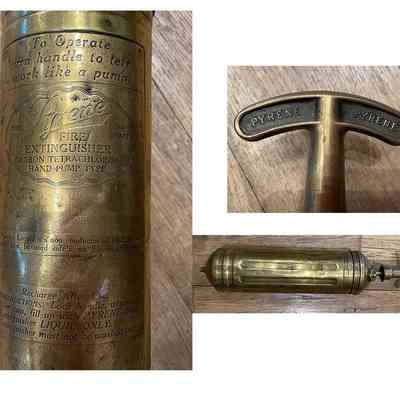 Details of front, handle and back of extingu