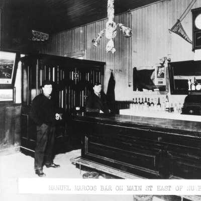 Manuel Marcos Bar (Prather): The Manuel Marcos Bar with patron on Main Street in Pinole, CA.