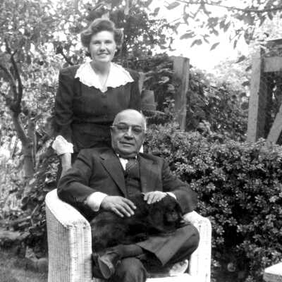 Dr. Manuel and Bernice Fernandez 1940 (cropped): Dr. Manuel Fernandez, son of Bernardo and Carlotta Fernandez, with wife Bernice in a garden.