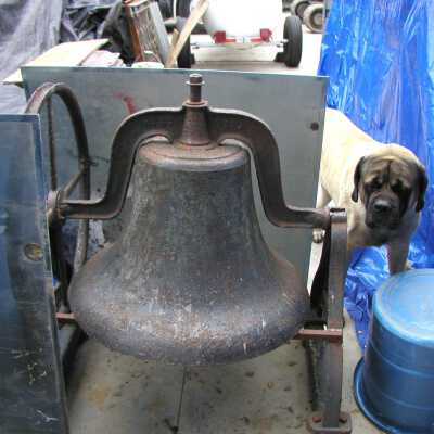 School bell (McKim property 1:12): Dog and school bell on the property.