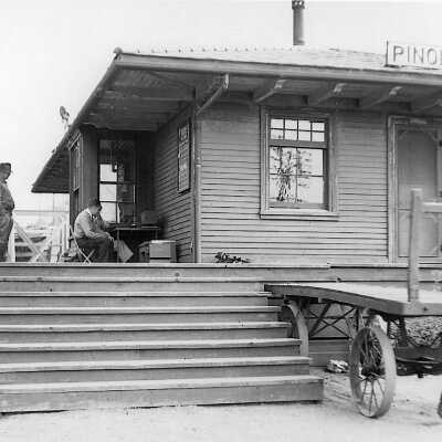 Santa Fe Depot w: 2 men 1939 (city)
