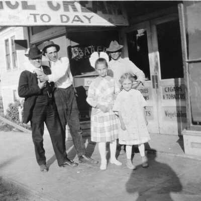 Woy Bakery and group in front (10888T) CCCHS: Men and children gather in front of the Woy's Pinole Bakery, circa early 1900s.