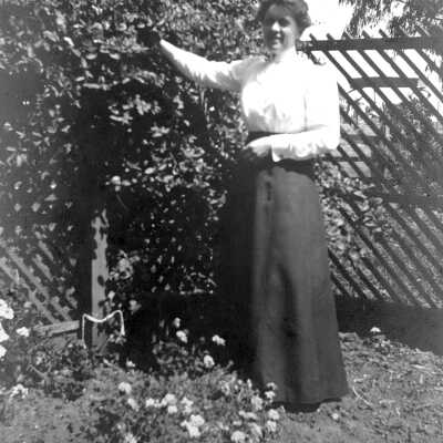 Ellerhorst daughter (Mariotti:Downer): Photograph of Christina and C. H. Ellerhorst's daughter outside in a garden like setting.