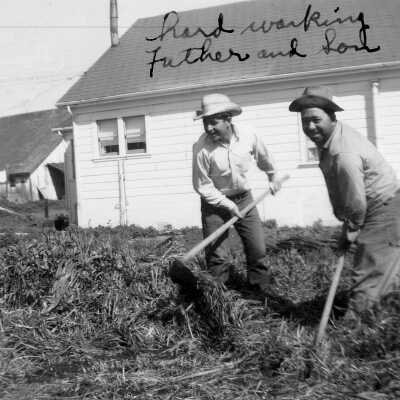 SIMAS Tony Jr. and Tony Sr. on ranch (Mary Simas): Photograph of Tony Simas Sr. and Jr. working the land of a backyard.