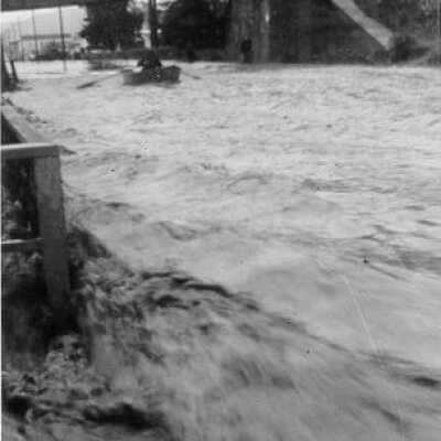 1958-Flood -2 Looking north on Tennent Ave. at the BNSF trestle