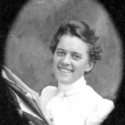 Cameo of Ellerhorst daughter # 1 (Mariotti): Portrait of Christina and C. H. Ellerhorst's daughter smiling and reading papers. 
