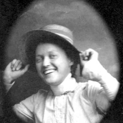 Cameo of Ellerhorst daughter #2 (Mariotti): Portrait of Christina and C. H. Ellerhorst's daughter smiling for the camera holding on to her hat. 