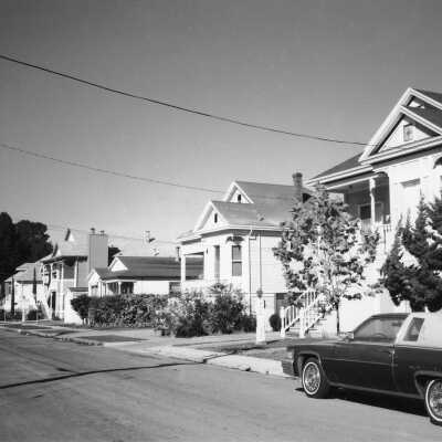 Queen Anne cottages on Quinan Street (8 inches) city: The Queen Anne cottages on Quinan Street are great examples of Queen Anne, Italianate, and Neoclassic architecture.