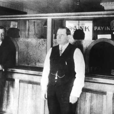 Bank of Pinole w:Mr. Downer: The bank’s founder, Edward M. Downer Sr., is on the left, and Assistant Cashier Thomas W. Hutchison is on the right in the second Bank of Pinole building, which opened in 1915. 