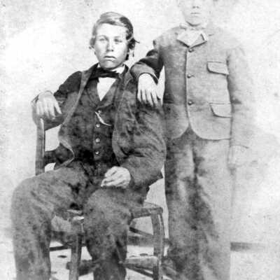 Samuel and James Tennent 1860s (Vincent): James and Samuel were two of the 10 children of Dr. Samuel and Rafaela Tennent. James (seated) was the eldest son. Samuel (standing) was killed at age 16 in a horseback-riding accident. James would marry in 1880 and build a two-story home, across the street from his father’s home, for his new bride, Louise. This home later belonged to Joseph Dutra Faria and his wife, Maria Nunes Faria, and their children.