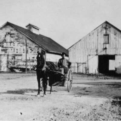 Mollie Rose Ranch and buther cart in front of Fernandez warehouses 1516 CCCHS