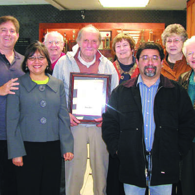 Group photo with Jeff: Group photo with Joe Mariotti holding his commemorative plaque from the Historical Landmarks Advisory Committee with Jeff and Norma Rubin to his right. 