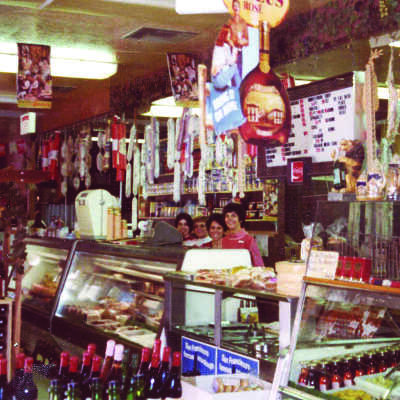 C and C Deli-Ida and Crew 1977 COLOR: Inside of the C&C Continental Deli with owner and crew behind deli counter on San Pablo Avenue in 1977.