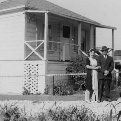 Ann and Manual Pires in front of house, 674 SP Avenue (Lynette Lindsey)