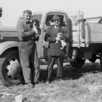 Manual Pires (right) and worker with truck (Lynette Lindsey)