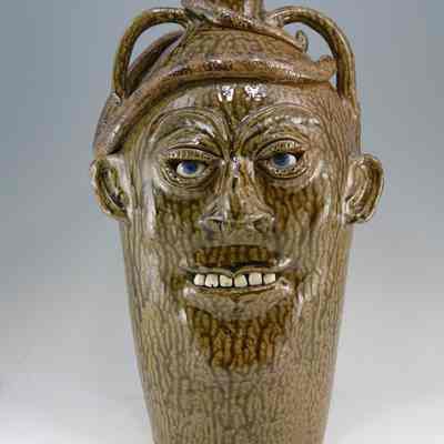Two- handled, five-gallon Face Jug
