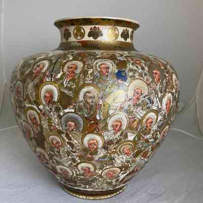 Gold-gilded ceramic vessel