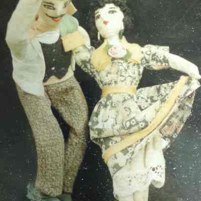 Male and Female Dolls Dancing