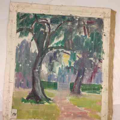 Trees over enterance to walled yard