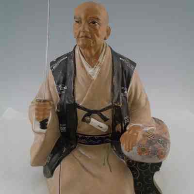 Oriental Ceramic Peasant Figure (Male)