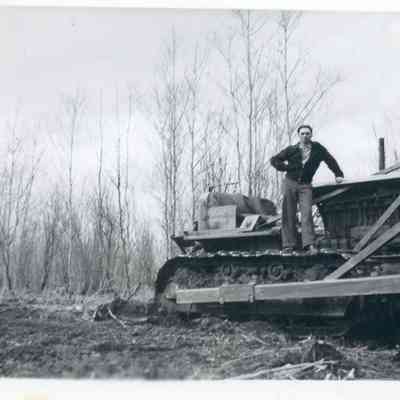 Man Next to Bulldozer