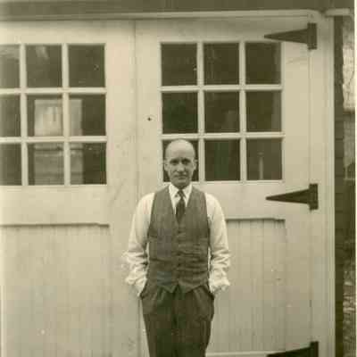 Man in Front of Garage