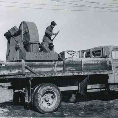 Man checking out Chipper Machine