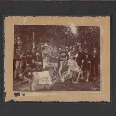 Photograph of Lacrosse team with their Mascot