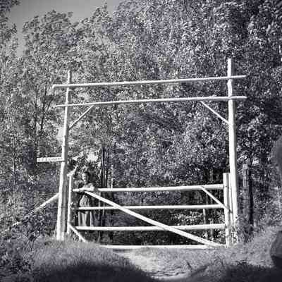 Wooden Gateway and a Woman