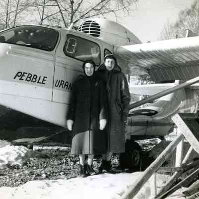 Two Women with a Pebble Plane