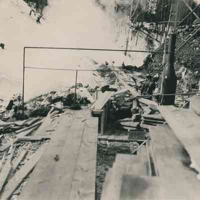 Lumber Pile by Hill
