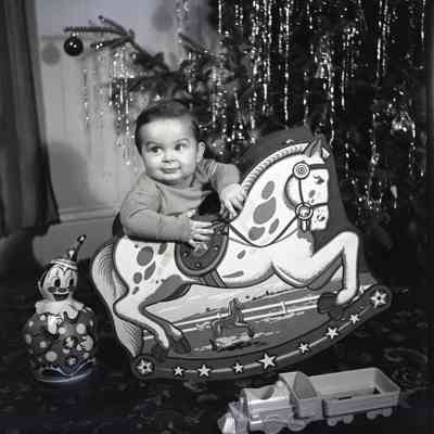 Baby With Rocking Horse