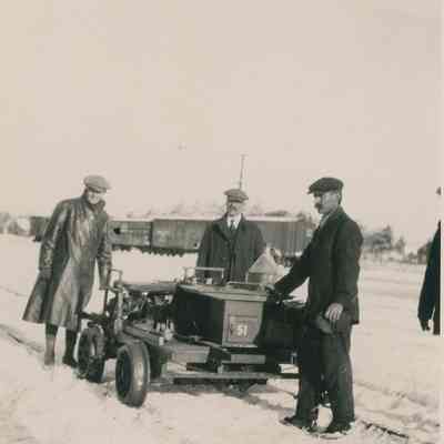 Men with Rail Cart