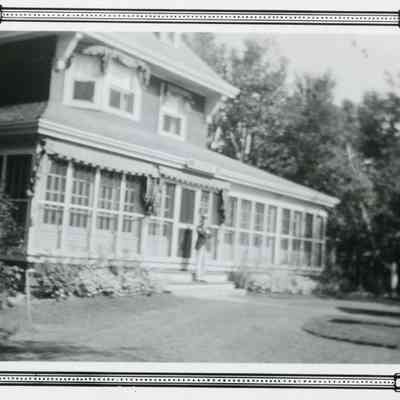 Man in front of Gordon Summer Home