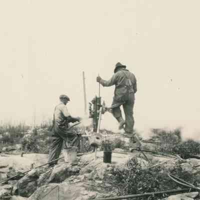 Men with Drill
