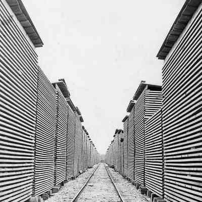 Log Sheds near the Railway