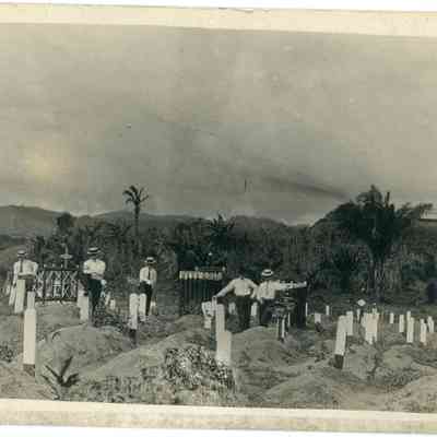 Postcard of Men In Cemetery