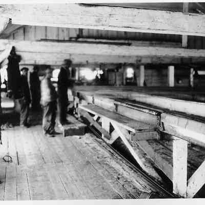 Men Inside Lumberyard House