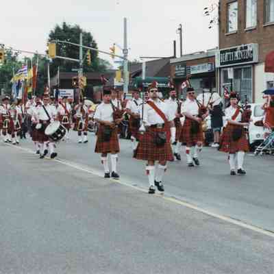 North Bay Pipe and Drums leading the 2000 North Bay Canada Day Parade
