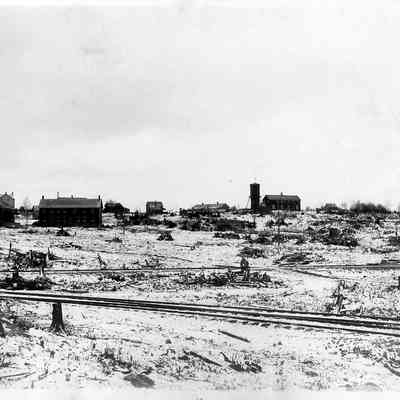 Distant View of Lumberyard and Railway Tracks