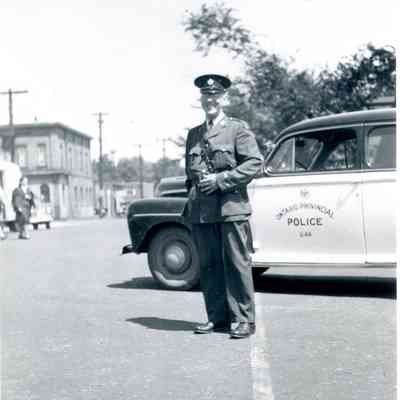 Constable Porter by Police Car