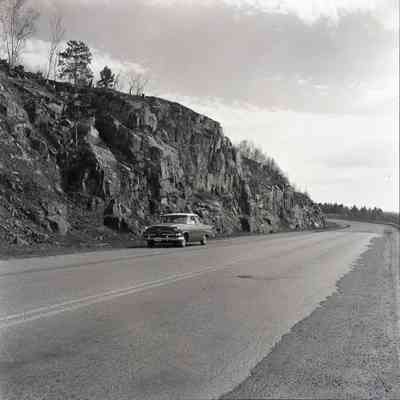 Highway and Bare Rock Cliffs