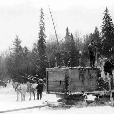 Man Hauling Water Out of the Lake