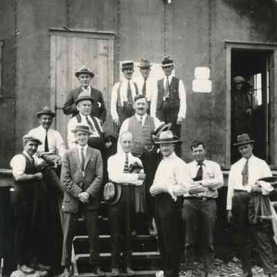 Group of Men in Front of Building