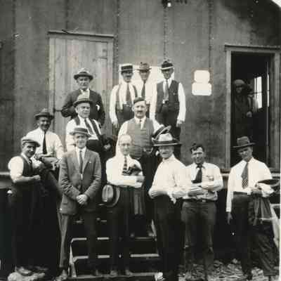 Men in Front of Building