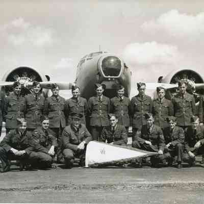 Ground Crew in front of Avro Anson II at North Bay Airport.