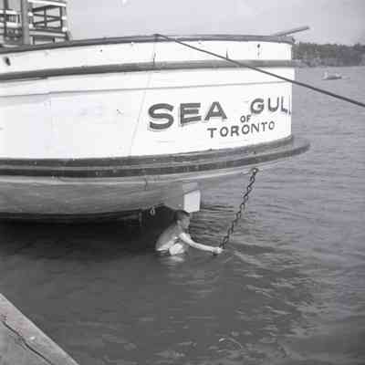 Boy Swimming under "Sea Gull"